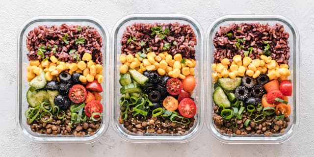 Three prepared lunch containers, used as illustrative stock photography